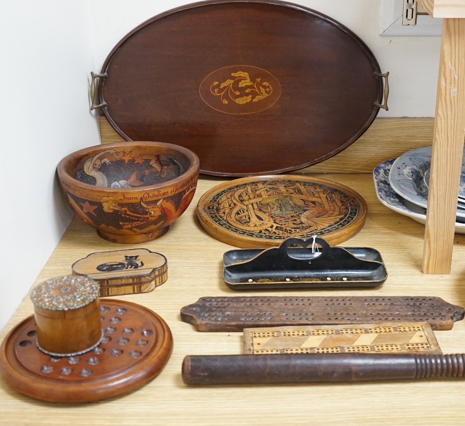 A group of wood items to include two cribbage boards, a mahogany solitaire board with marbles, a truncheon and an inlaid oval tray. etc., largest 60cm wide. Condition - varies, poor to fair